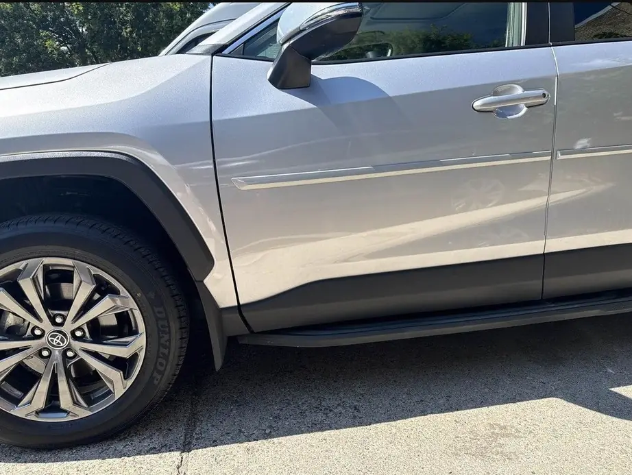 The same Toyota RAV4 after door repair and paint blend